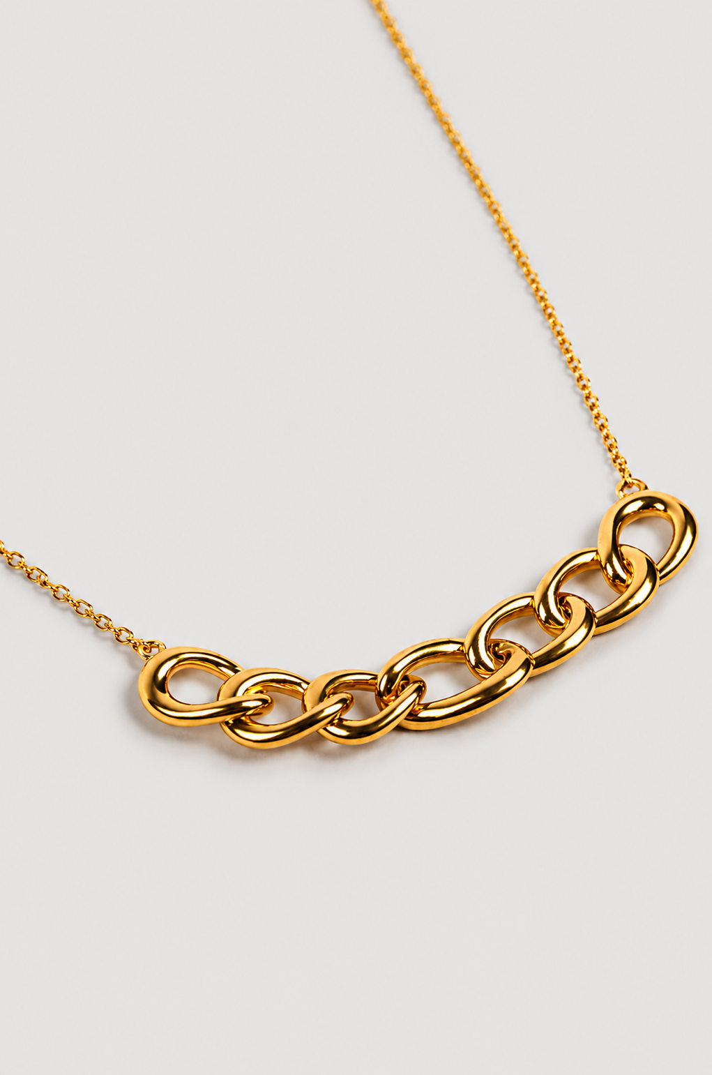 Elegant Gaath Necklace with softly linked forms resting naturally on the neckline, showcasing fluid and intimate design
