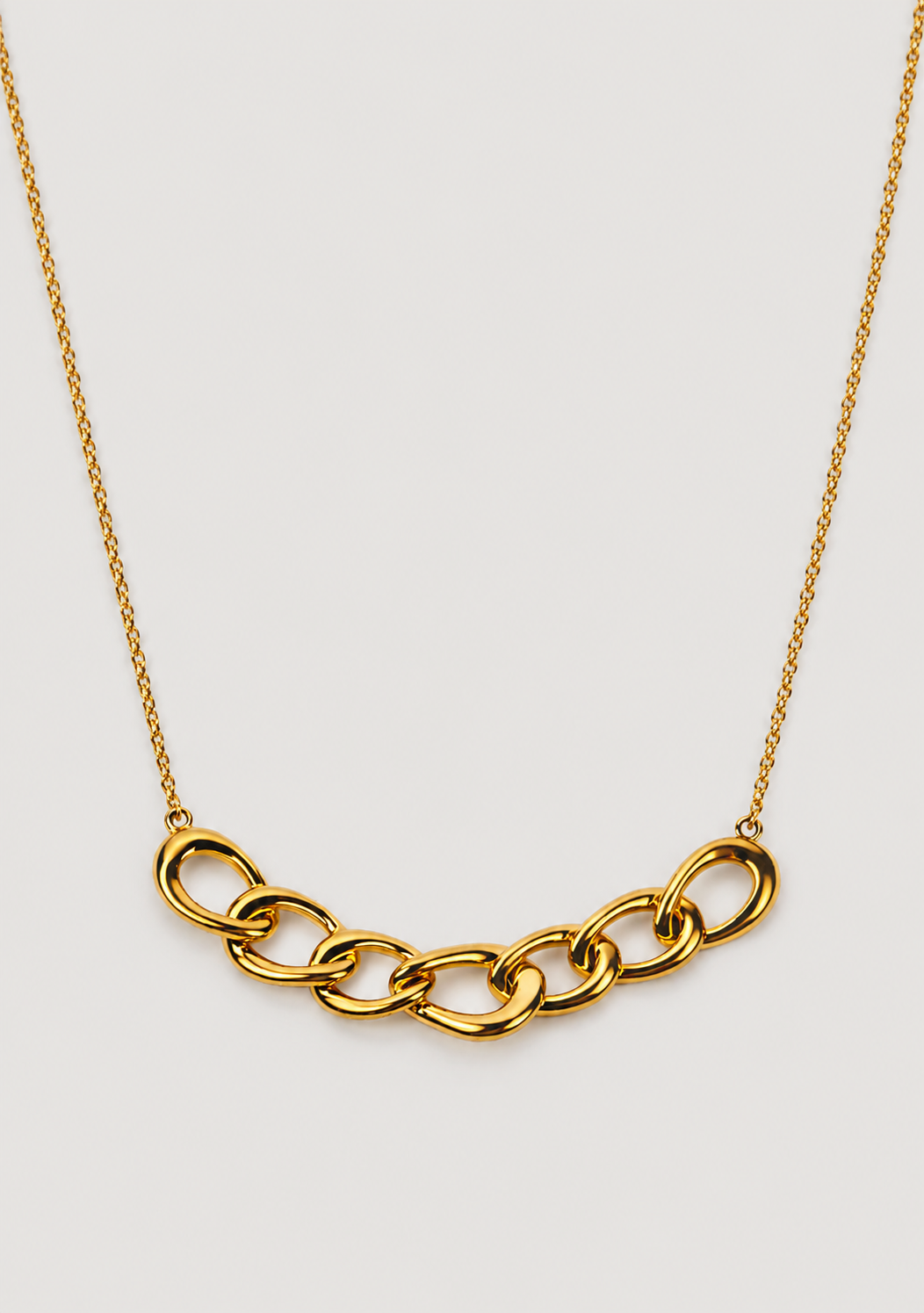 Gaath Necklace with softly linked forms resting naturally along the neckline