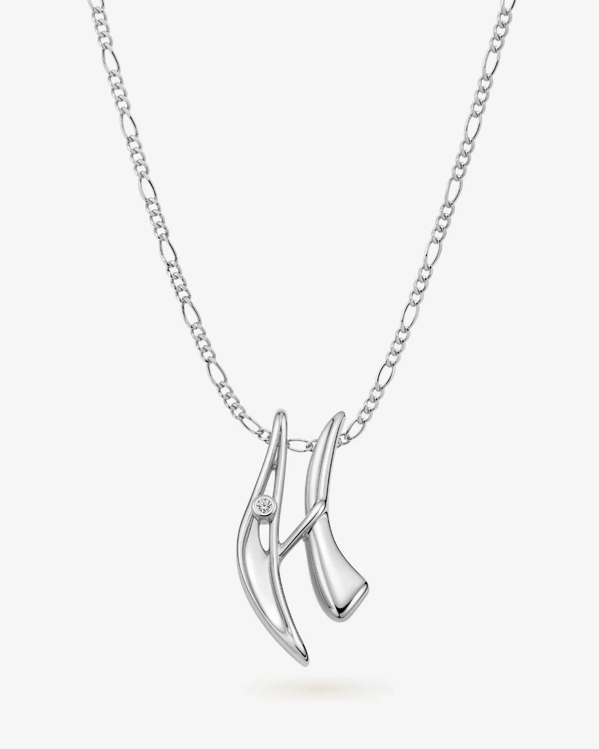 H एच Initial Necklace in polished silver-tone metal, with a fine chain and sculptural crossed letterform pendant accented by a clear stone.