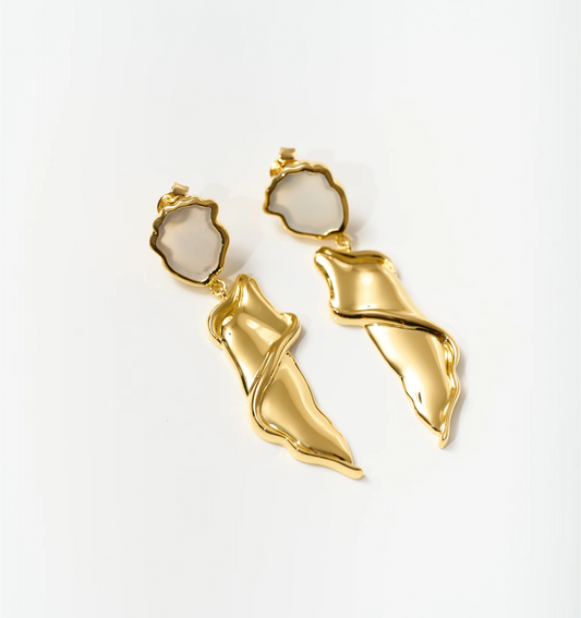 Thalena Earrings with sculpted gold and moonstone accents on white background