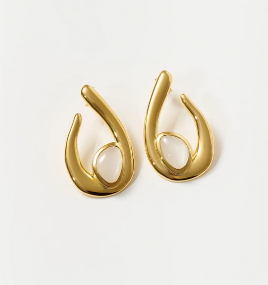 Lunara Earrings gold sculptural design with white moonstone centerpiece
