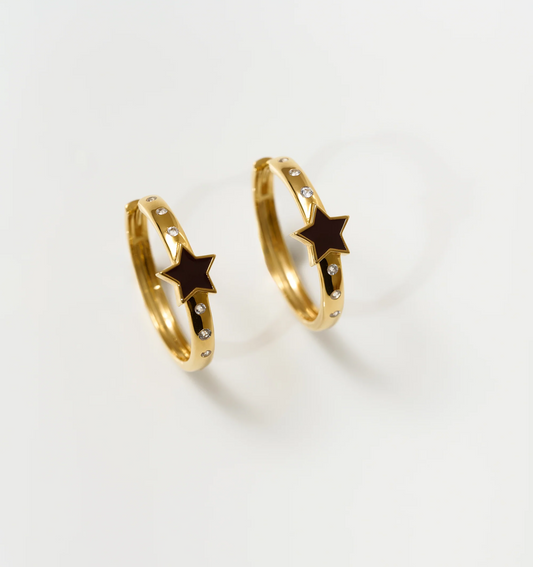 Tara Nova Hoop gold earrings with black star and white topaz accents