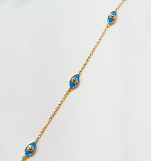 Dhrish Bracelet gold chain with turquoise enamel eye charms symbolizing clarity and protection