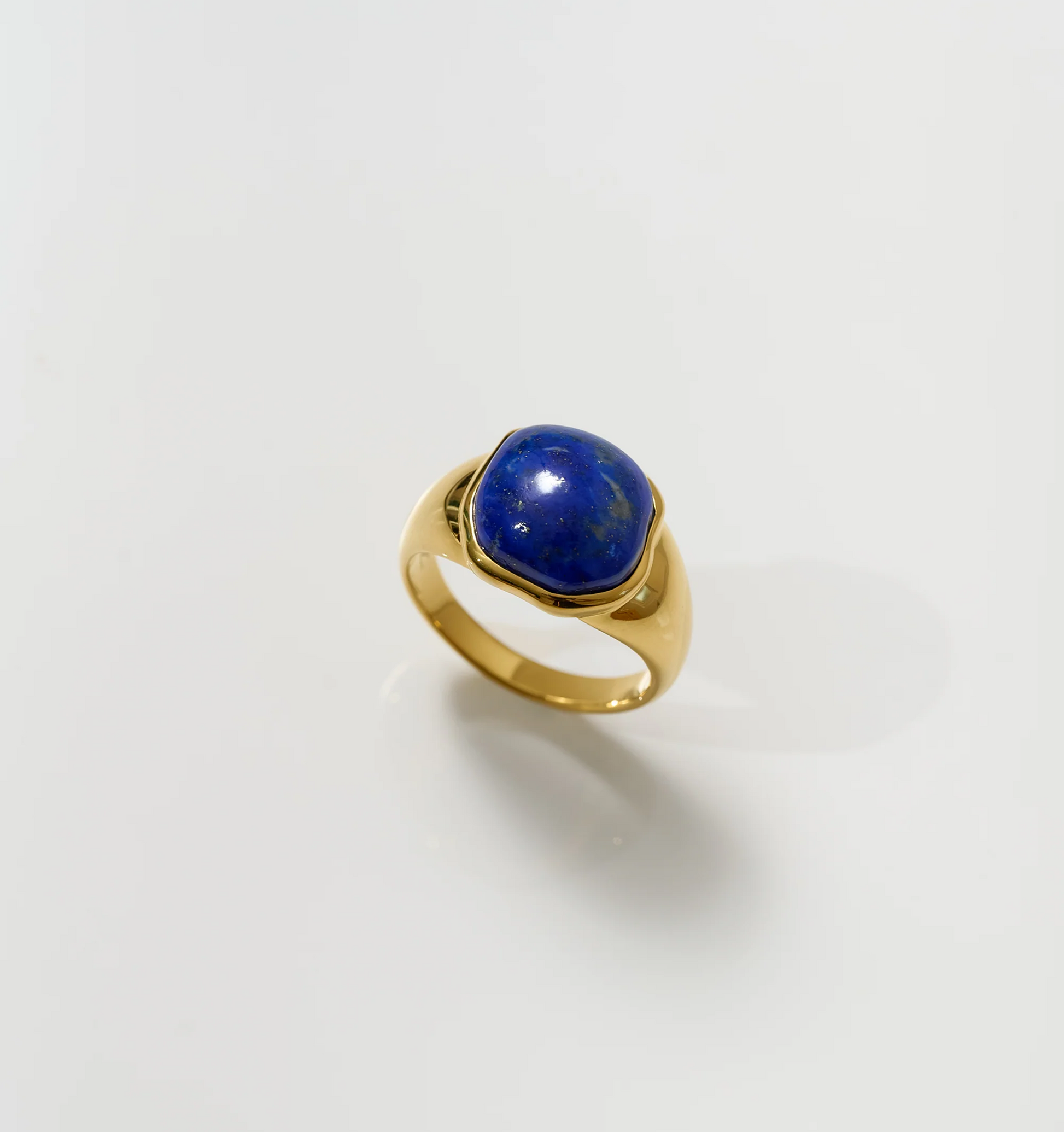Neelaya Ring featuring bold lapis gemstone set in gold band signifying introspection and inner truth