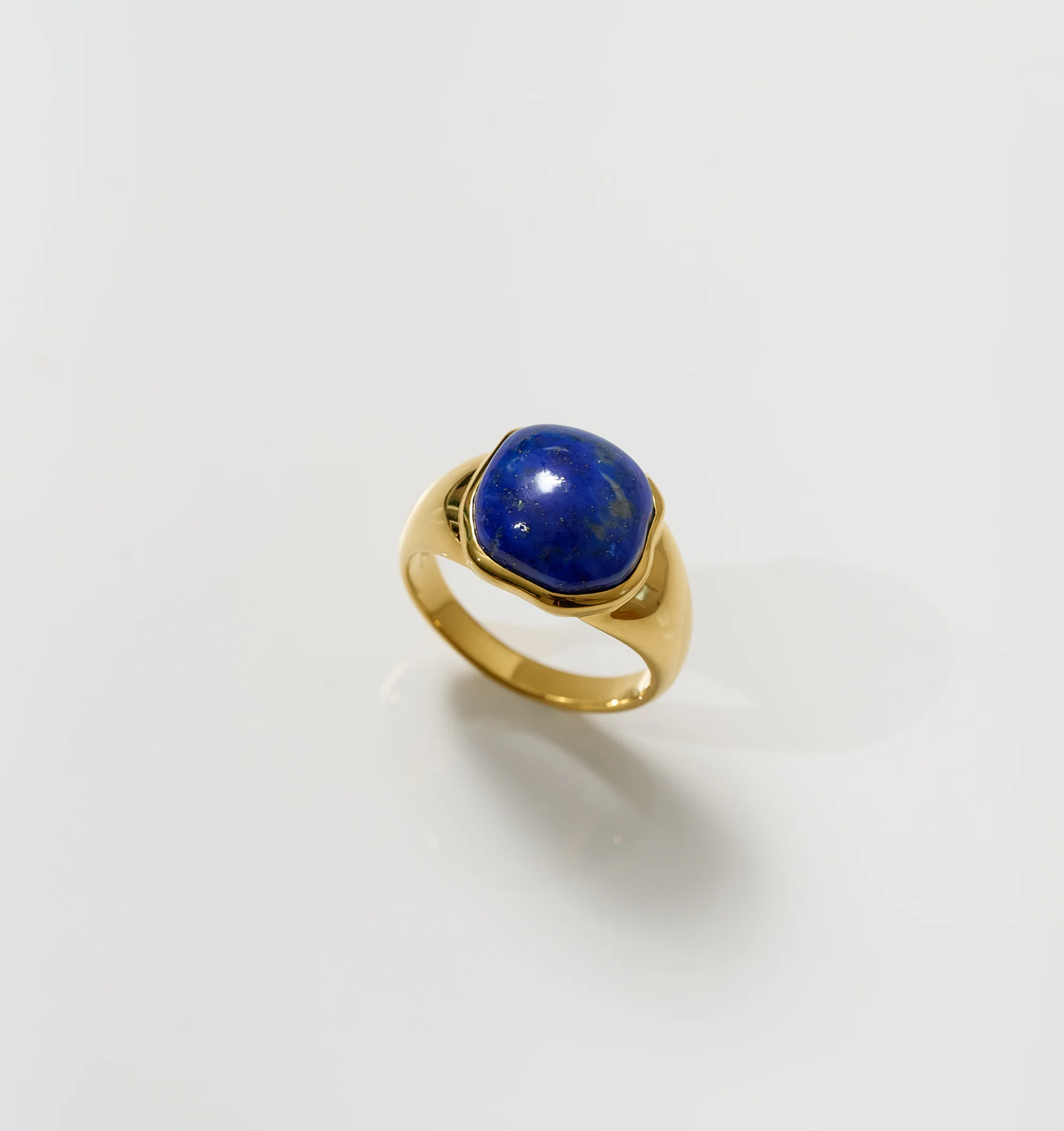 Neelaya Ring featuring bold lapis gemstone set in gold band signifying introspection and inner truth