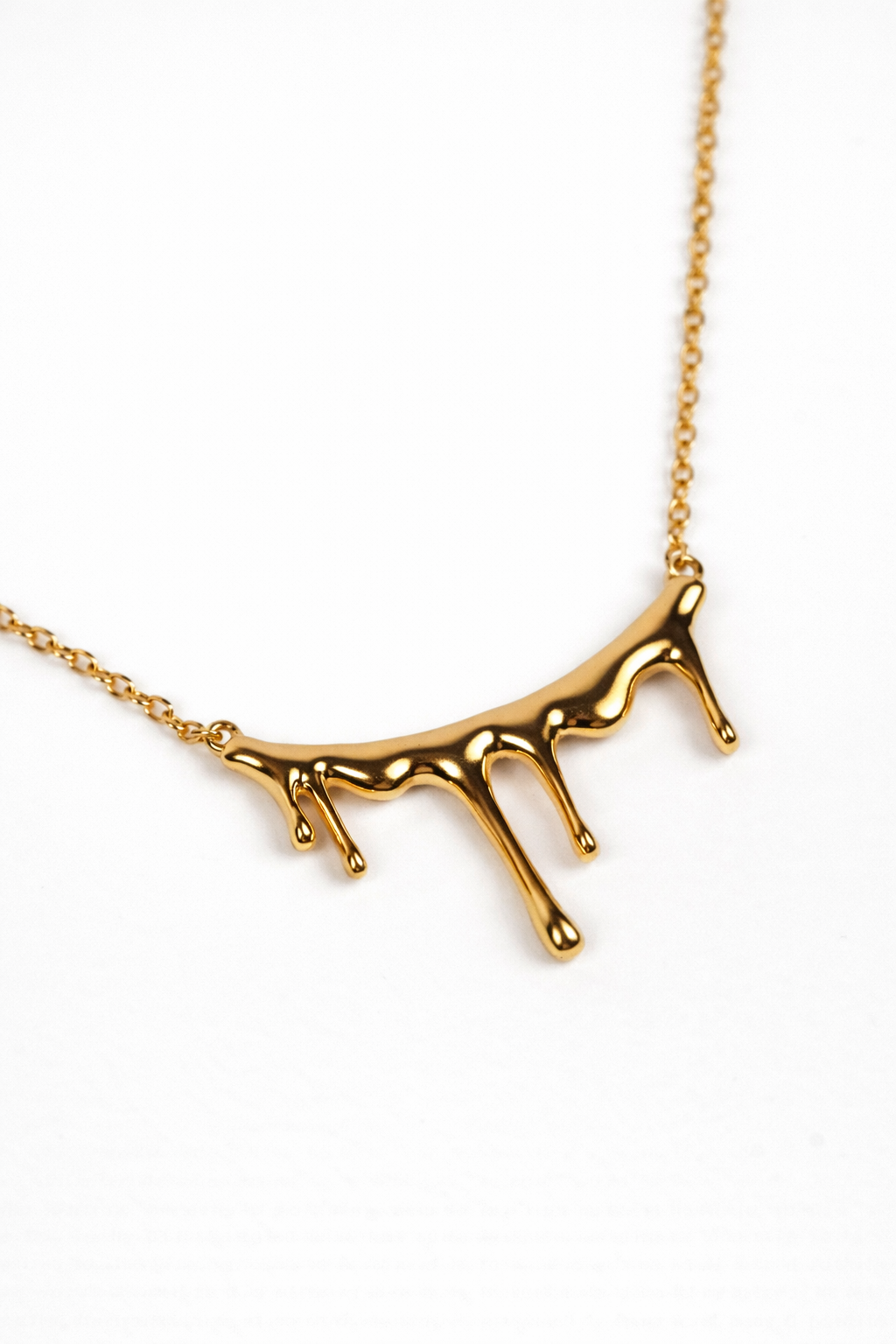 Jharna Necklace with curved neckline and delicate hanging drops creating a flowing cascade effect