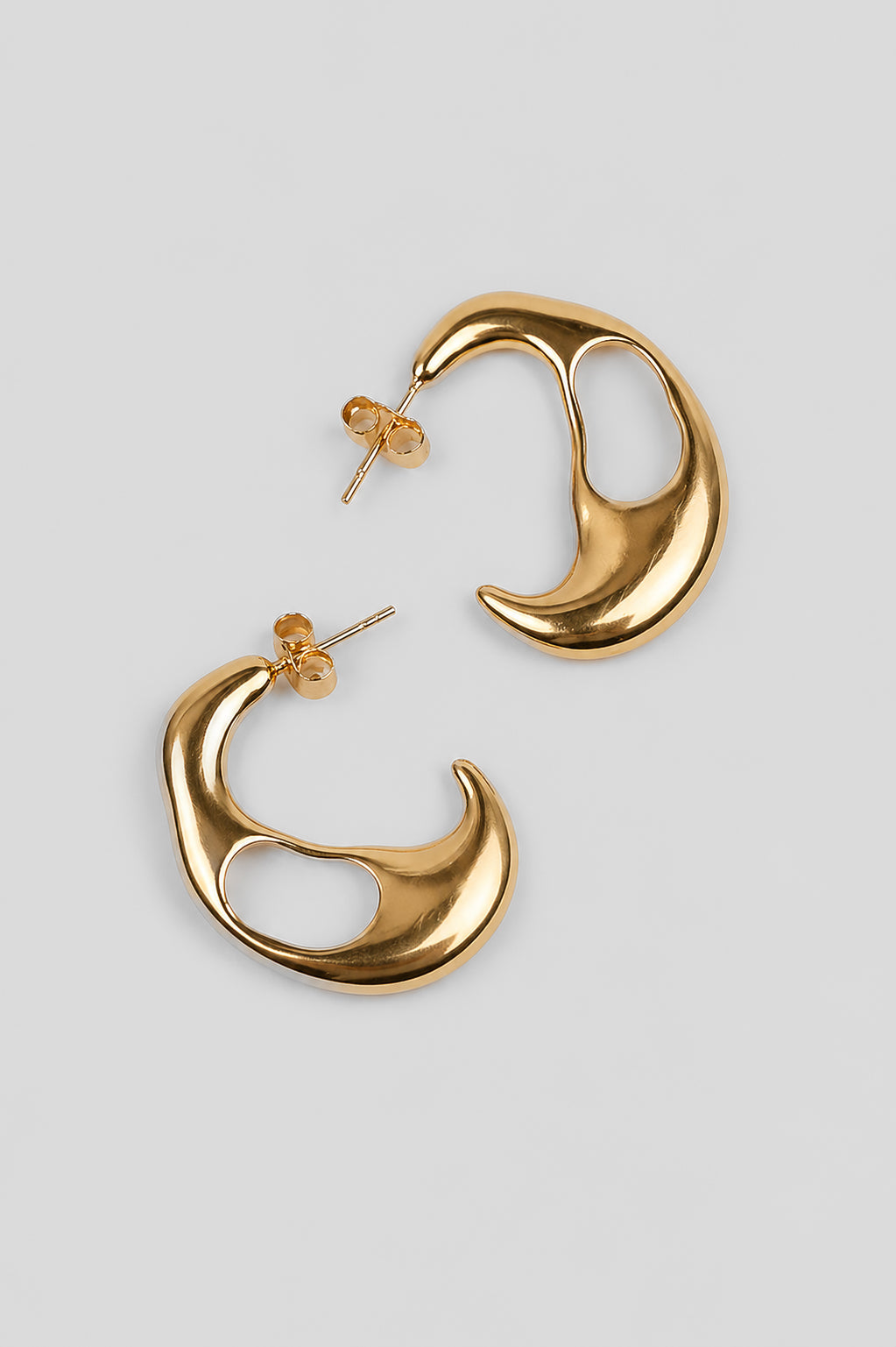 Kala Earring crescent-shaped with soft edges and balanced silhouette
