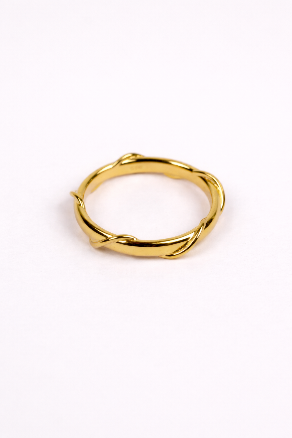 Kriti Ring with organically textured uneven band showcasing raw and tactile design