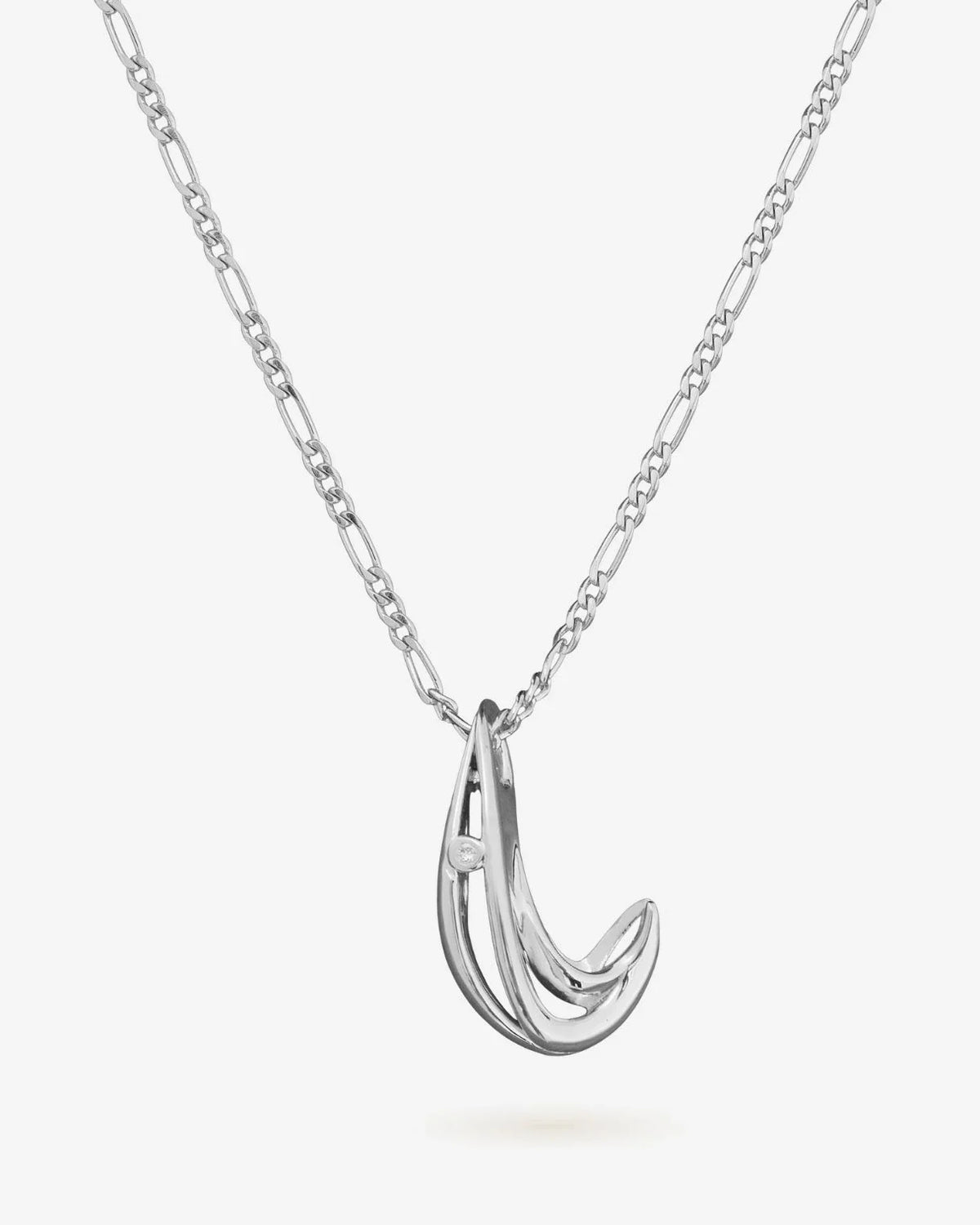 Silver-tone L एल Initial Necklace with a sculpted, curved letter pendant and fine chain, featuring a small clear stone.