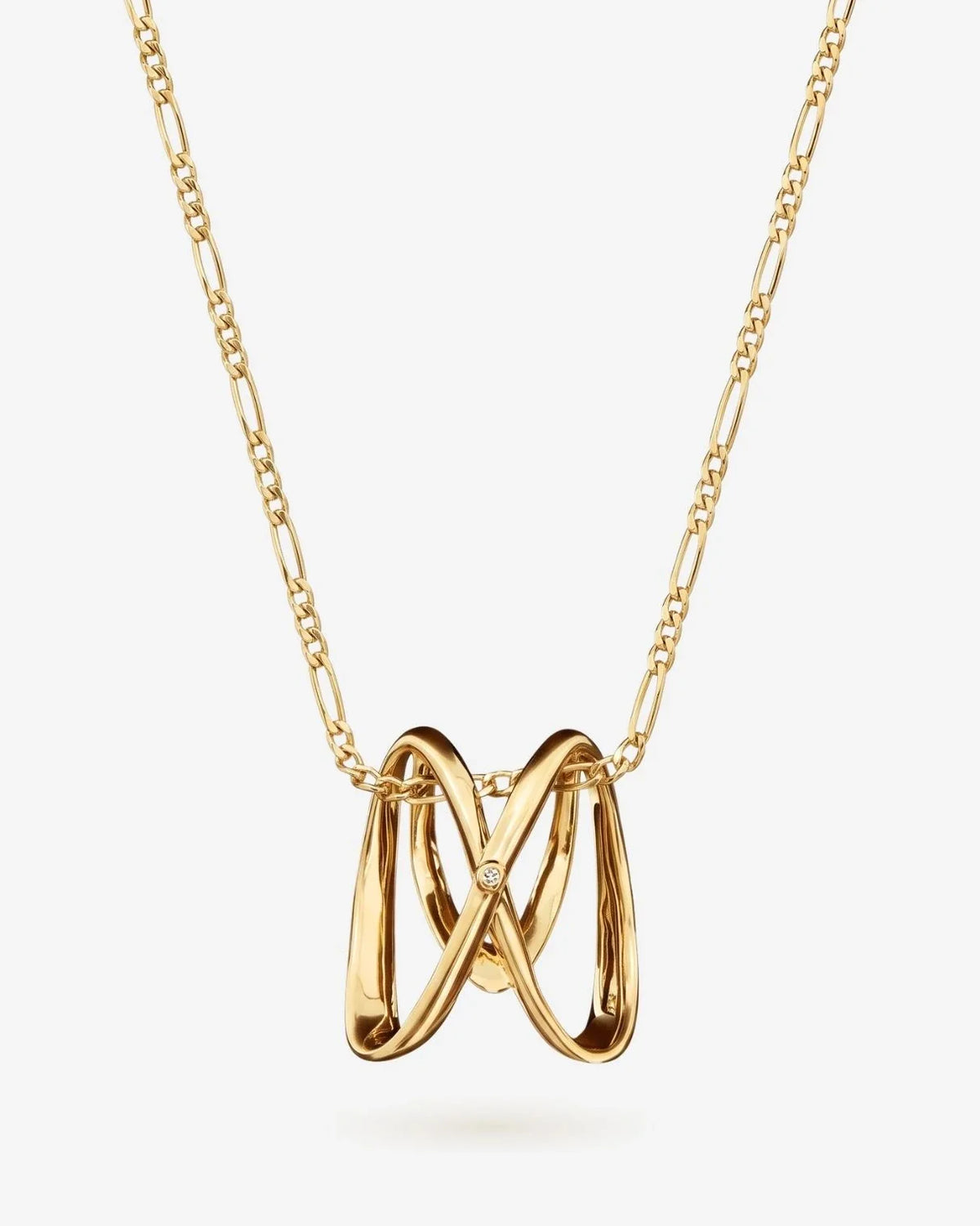 M एम Initial Necklace in polished gold-tone metal, featuring a sculptural looping M-shaped pendant with a small clear stone.