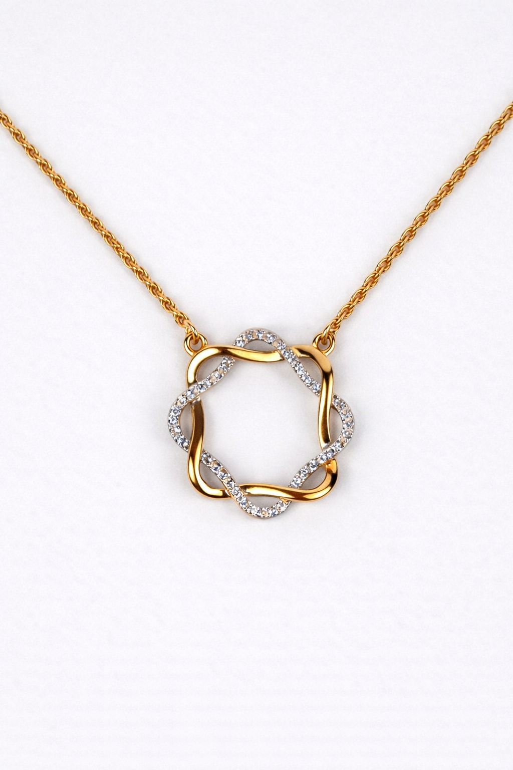 Mandala Necklace featuring white topaz stones in a modern circular design for clarity and harmony