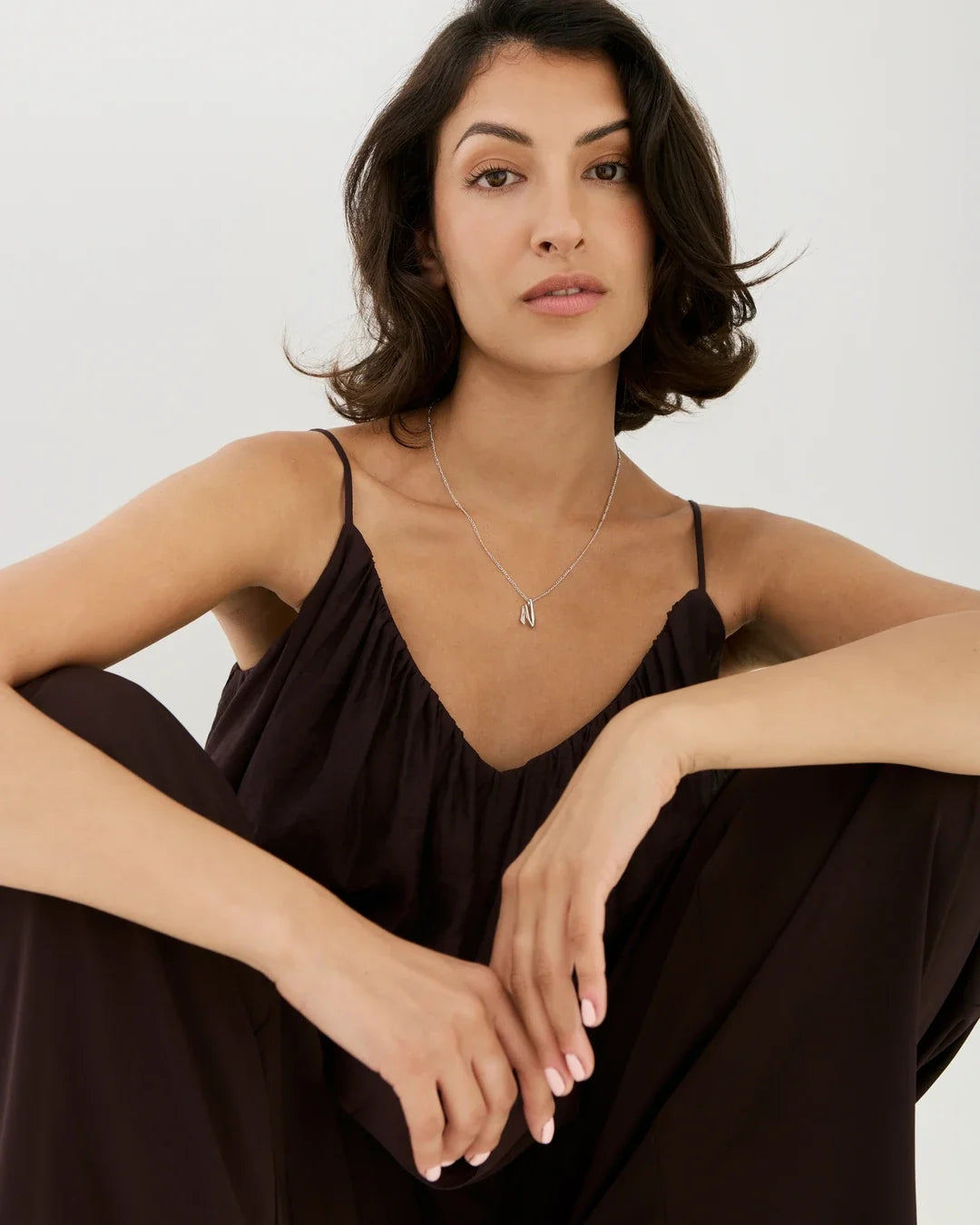 N एन Initial Necklace in delicate silver-tone metal with a fine chain and small letter pendant.
