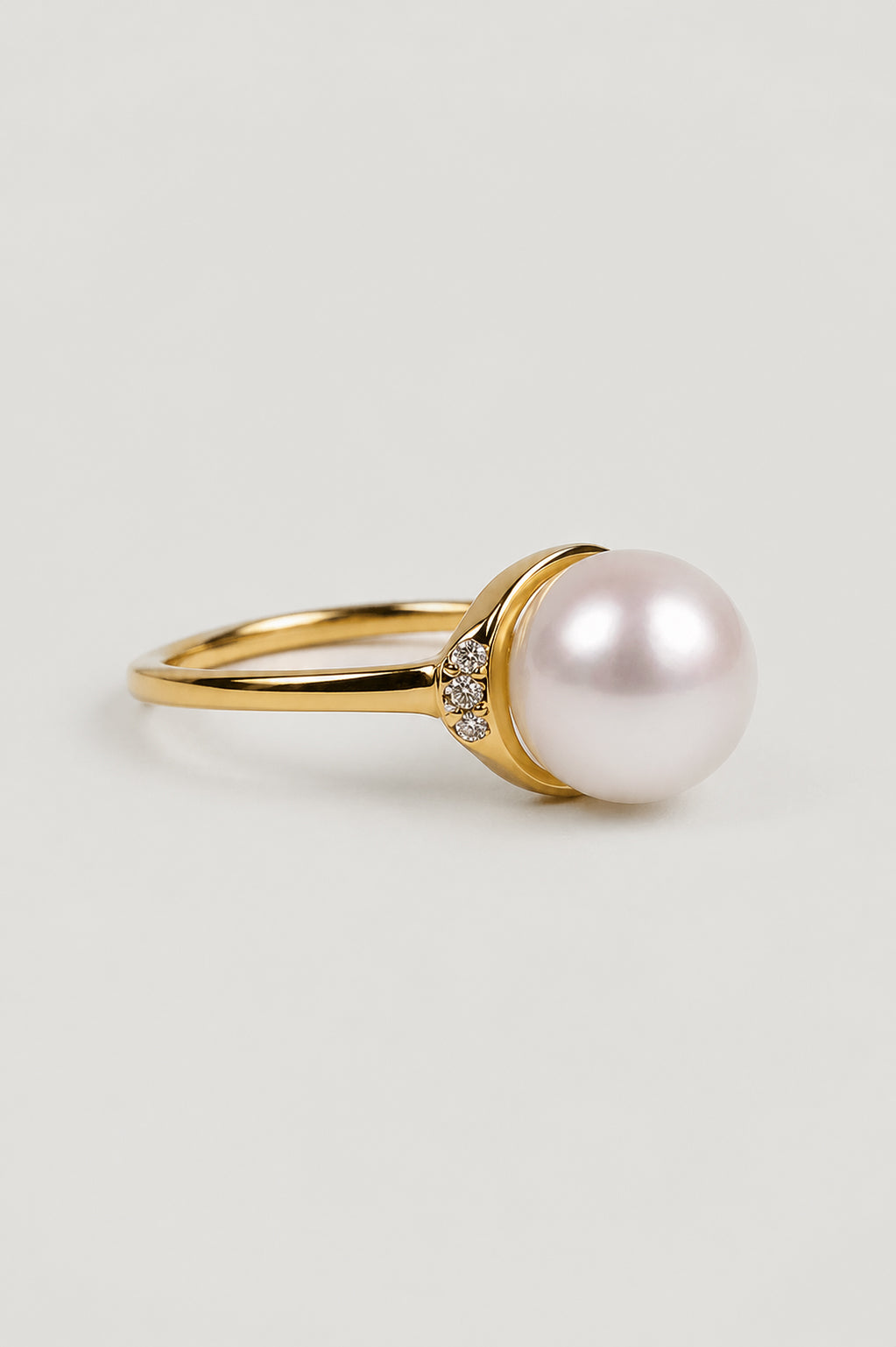 Niyam Ring featuring a freshwater pearl and four lab-grown diamonds in 925 sterling silver with 18K gold vermeil