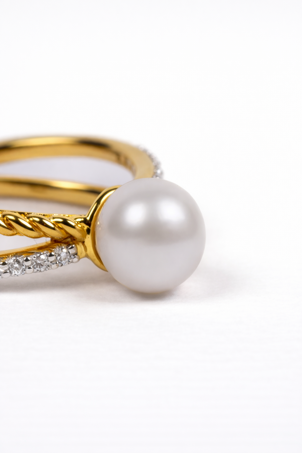 Paridhi Ring with luminous pearl and lab-grown diamonds in a modern crossing design
