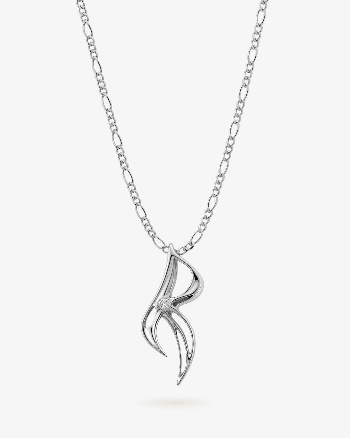 R आर Initial Necklace in polished silver-tone metal, with a delicate chain and sculpted flowing letter R pendant.