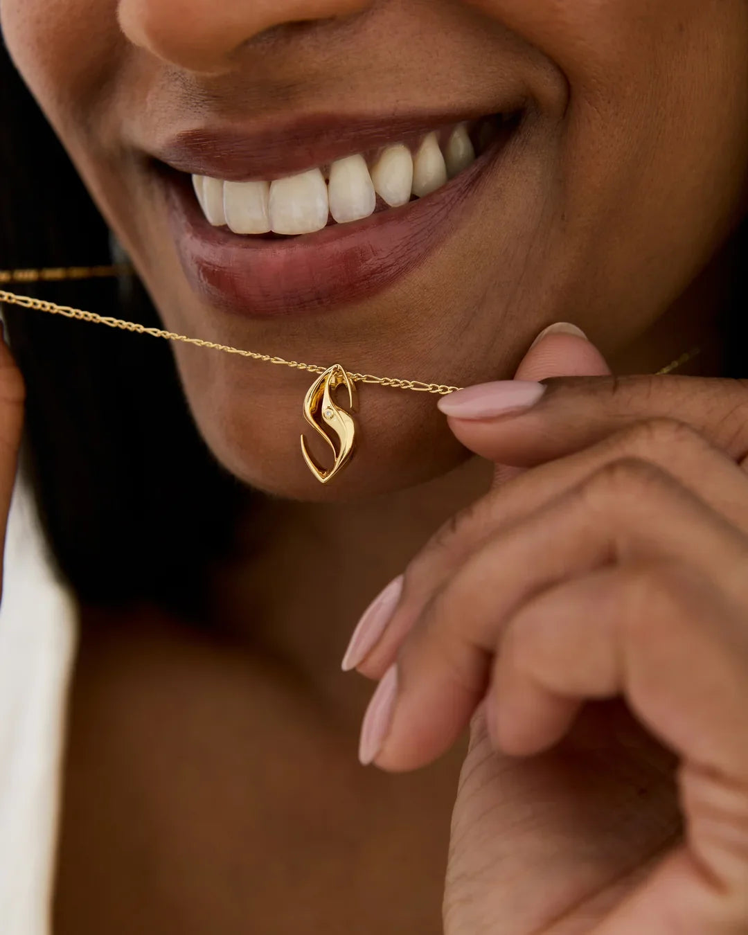 S एस Initial Necklace, gold-tone chain with a polished S-shaped pendant in a flowing, curved design.