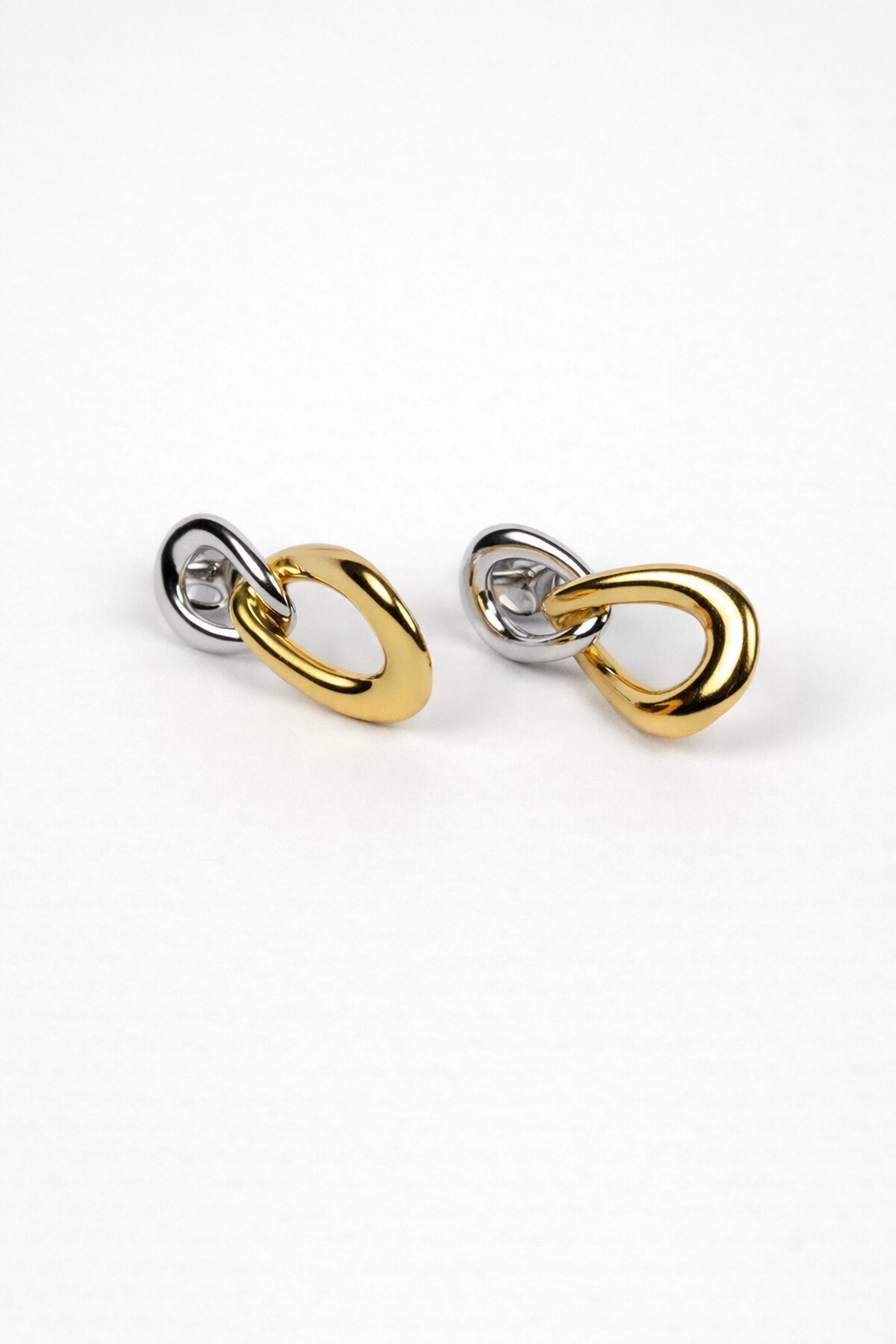 Sama Earring with two interlinked contrasting forms in balanced modern design