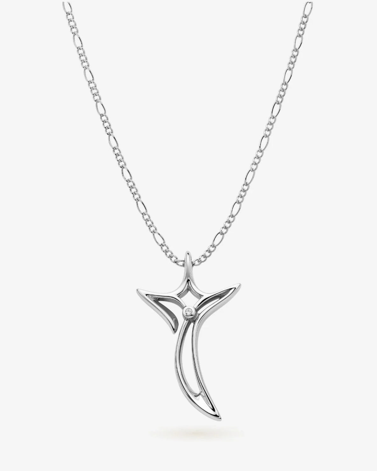 T टी Initial Necklace with a polished silver-tone chain, sculptural letter-shaped pendant and small clear stone accent.