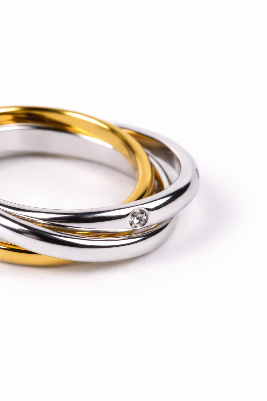 Traya Ring with three interlinked bands set with lab-grown diamonds symbolizing unity and strength