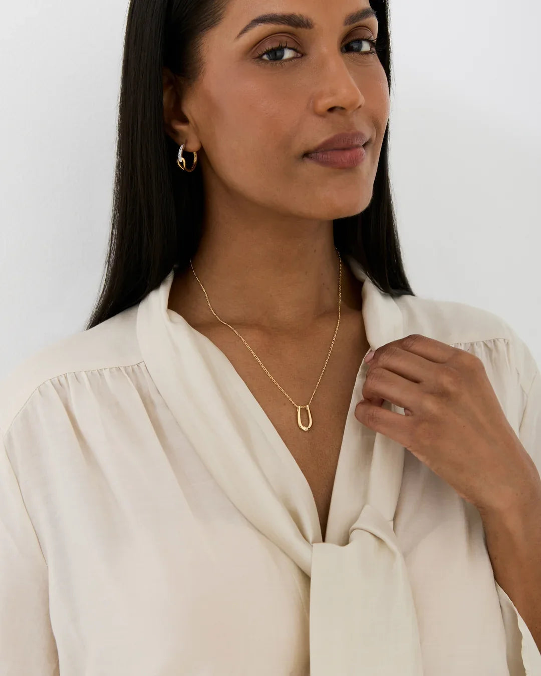 U यू Initial Necklace in a delicate gold-tone chain with a slim U-shaped pendant and polished finish.