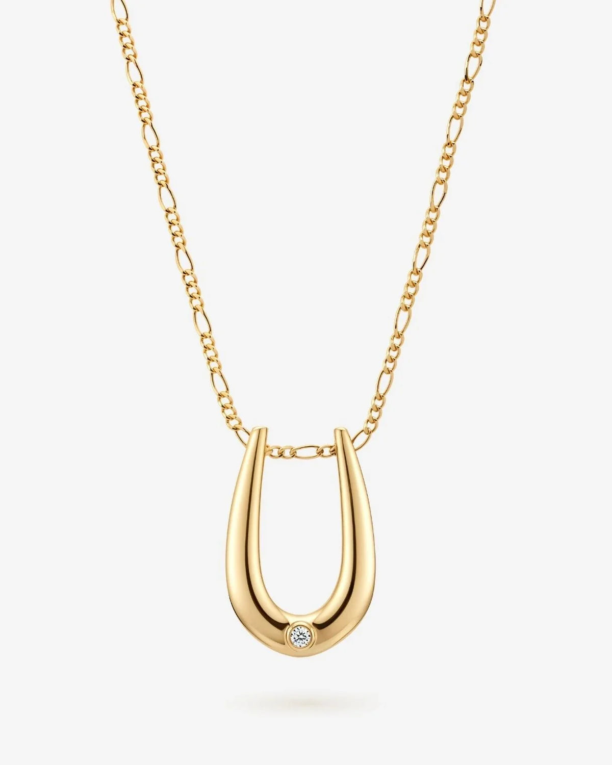 U यू Initial Necklace in polished gold-tone metal, featuring a curved U-shaped pendant with a small clear stone.