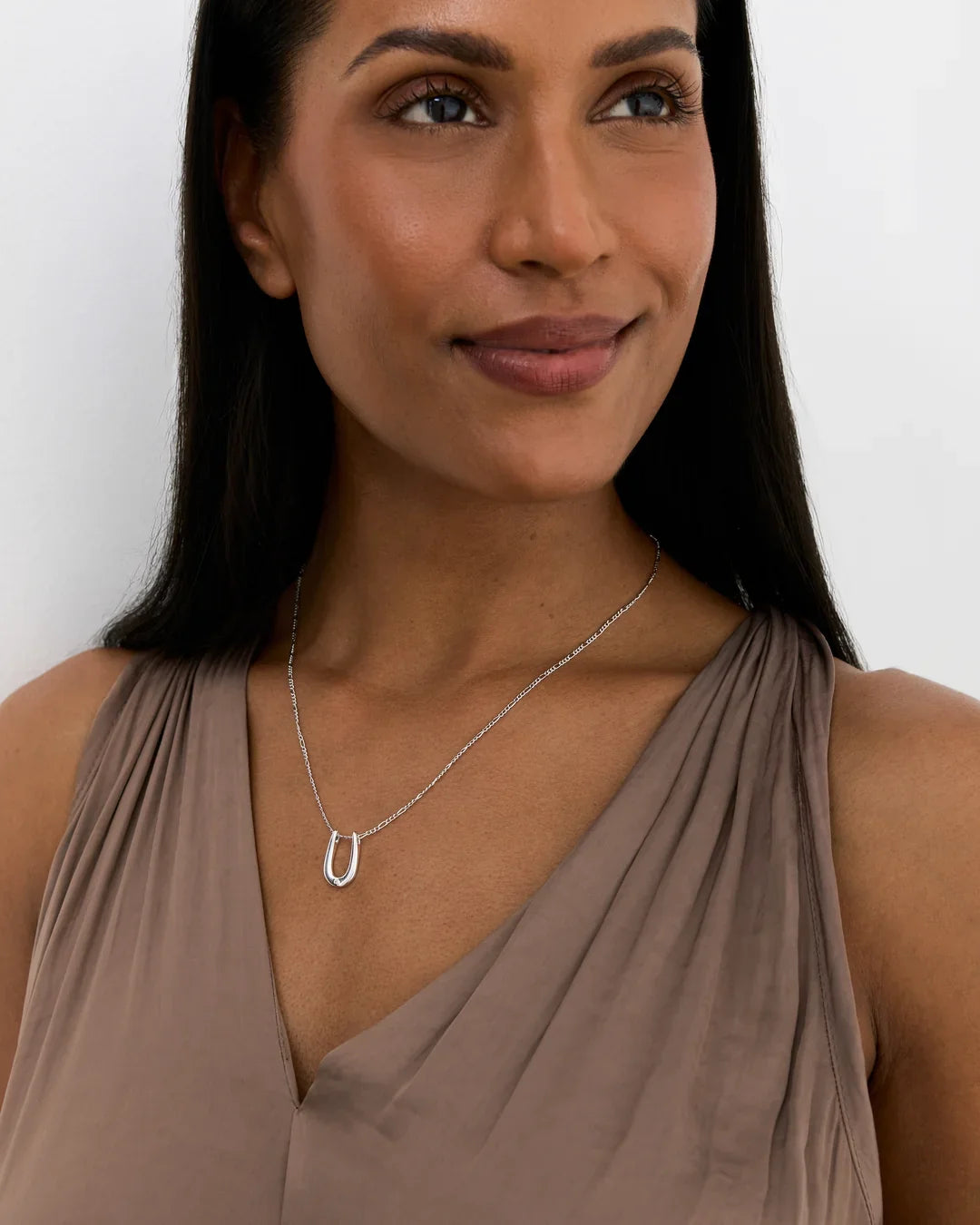 U यू Initial Necklace in silver-tone metal, with a delicate chain and polished U-shaped letter pendant.