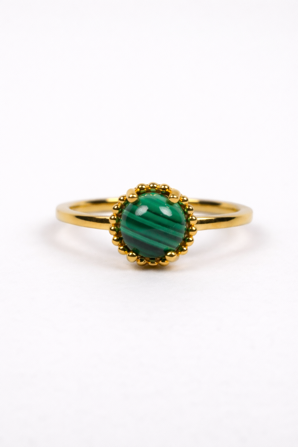 Vanya Ring with smooth round malachite stone in gold band, modern minimalist design