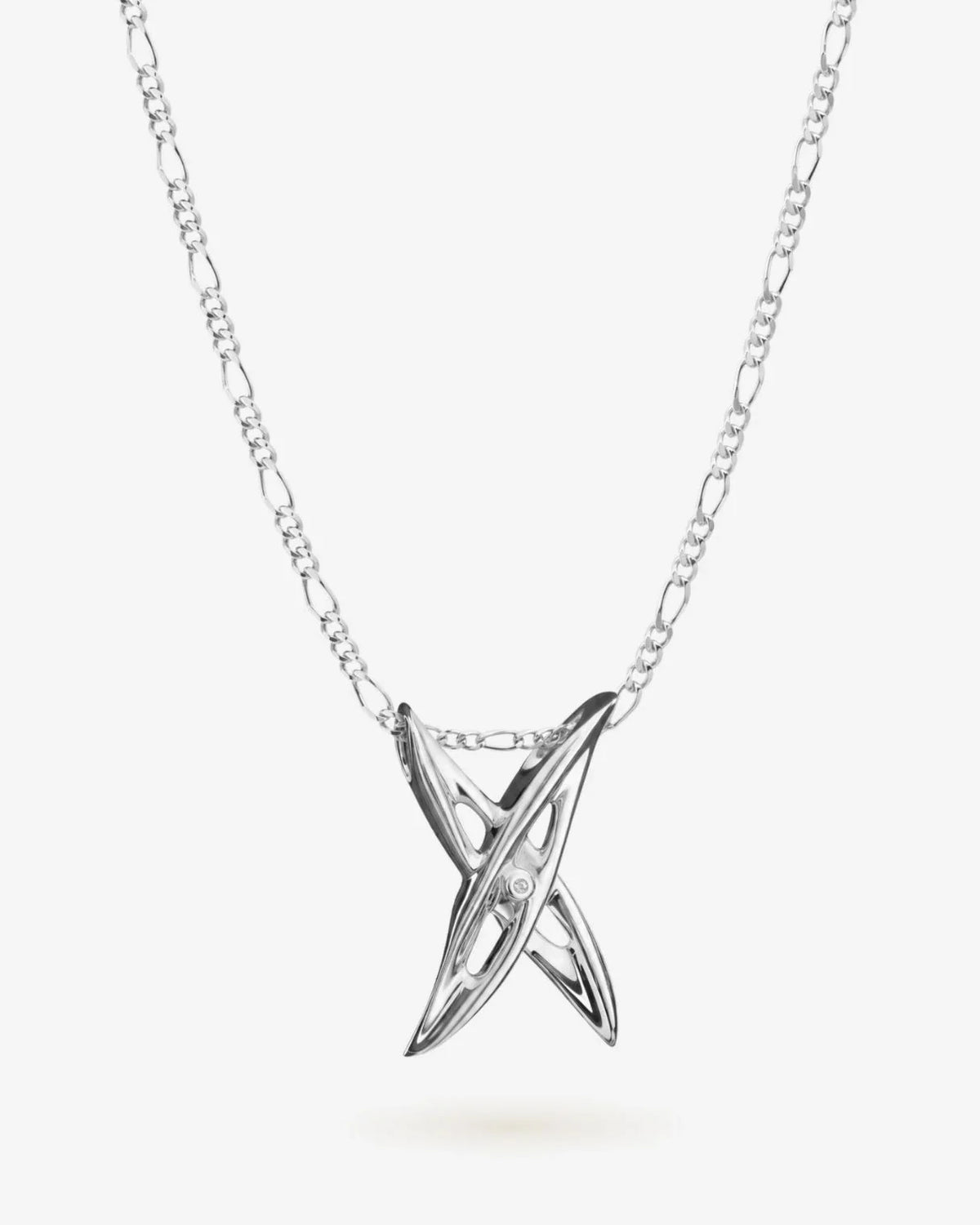 X एक्स Initial Necklace in silver-tone metal with a fine chain and sculptural crossed X pendant set with small clear stones.