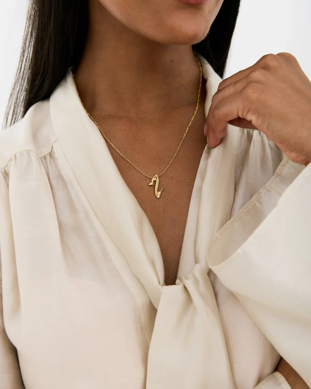Z ज़ेड Initial Necklace, a fine gold-tone chain with a small sculpted Z letter pendant.