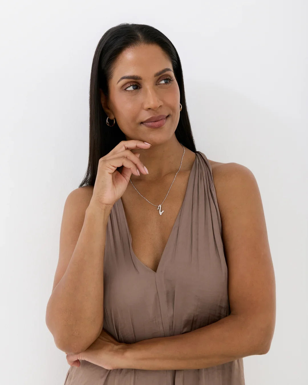 Z ज़ेड Initial Necklace, a delicate silver-tone chain with a small angular Z-shaped pendant in a minimalist design.