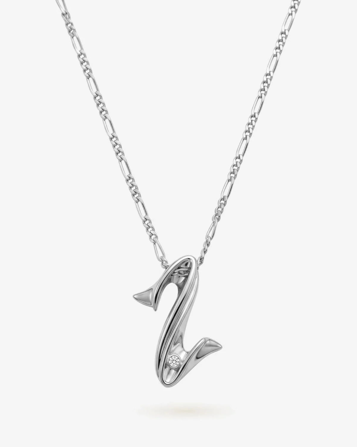 Z ज़ेड Initial Necklace in polished silver-tone metal, with a sculpted Z pendant and delicate chain.